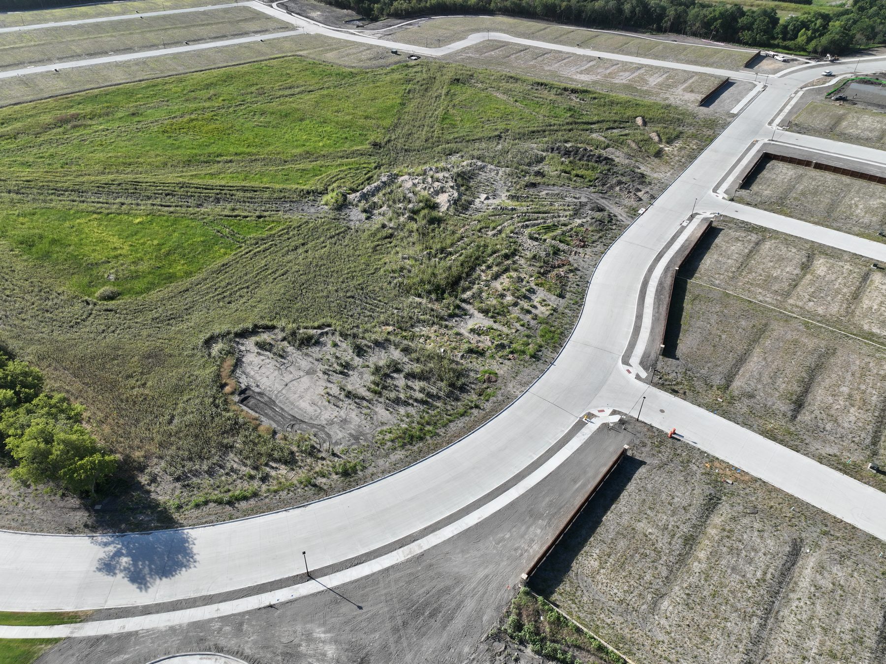 Aerial view of finished streets and delivered homesites at Elevon Phase 4 in Lavon, Texas